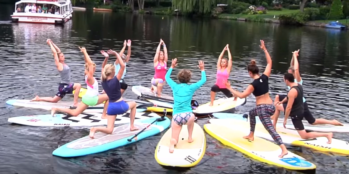 A yoga stand up paddle board class
